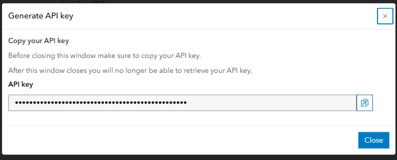 ArcGIS Online Generate API key dialog showing the Copy your API key field, with the generated key value redacted before it would normally display in full